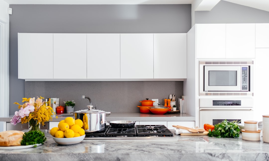 A neatly organized kitchen with labeled containers, tidy countertops, and a calm atmosphere.
