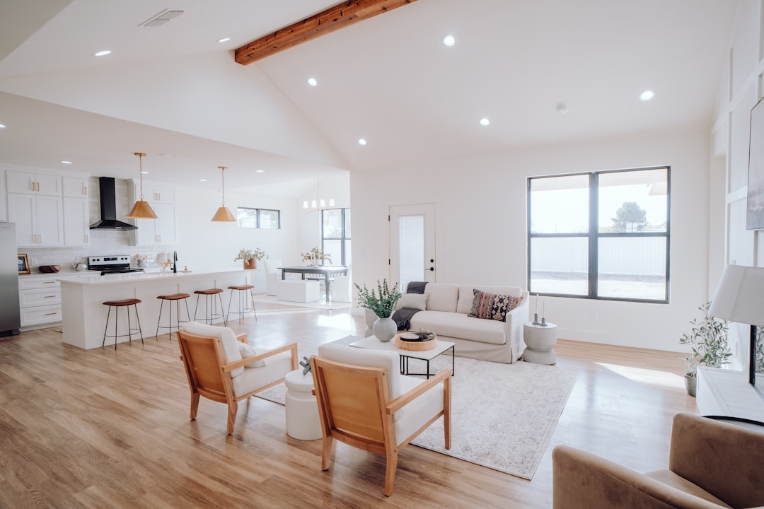 A cozy living room with soft lighting, comfortable furniture, and organized decor, showcasing a functional and inviting atmosphere.