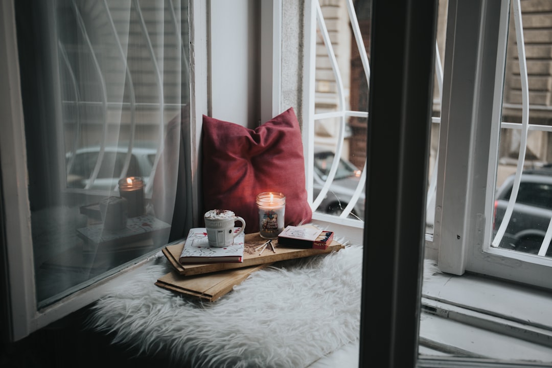 A warm and inviting living room with soft lighting, comfortable furniture, and decorative elements that create a cozy atmosphere.